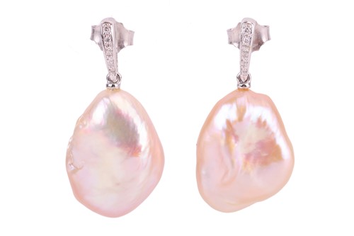 Lot A pair of baroque pearl drop earrings, each...