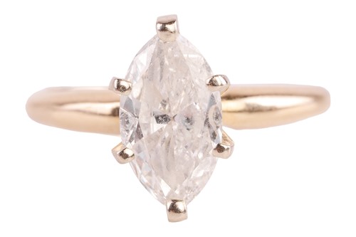 Lot A marquise-cut diamond solitaire ring, the...