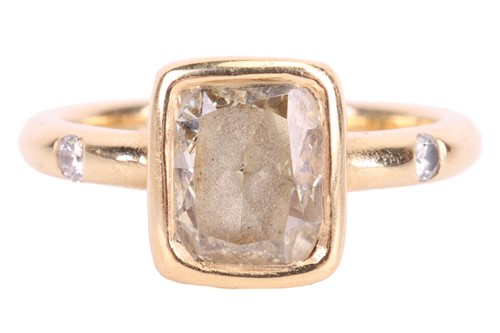 Lot A diamond solitaire ring, featuring a cushion...
