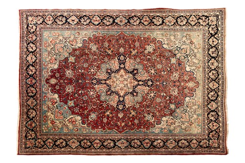 Lot 156 - A large muted red ground "Zeigler" style Mahal...