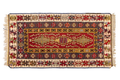 Lot 155 - A red ground Besarabian kilim, 20th century...