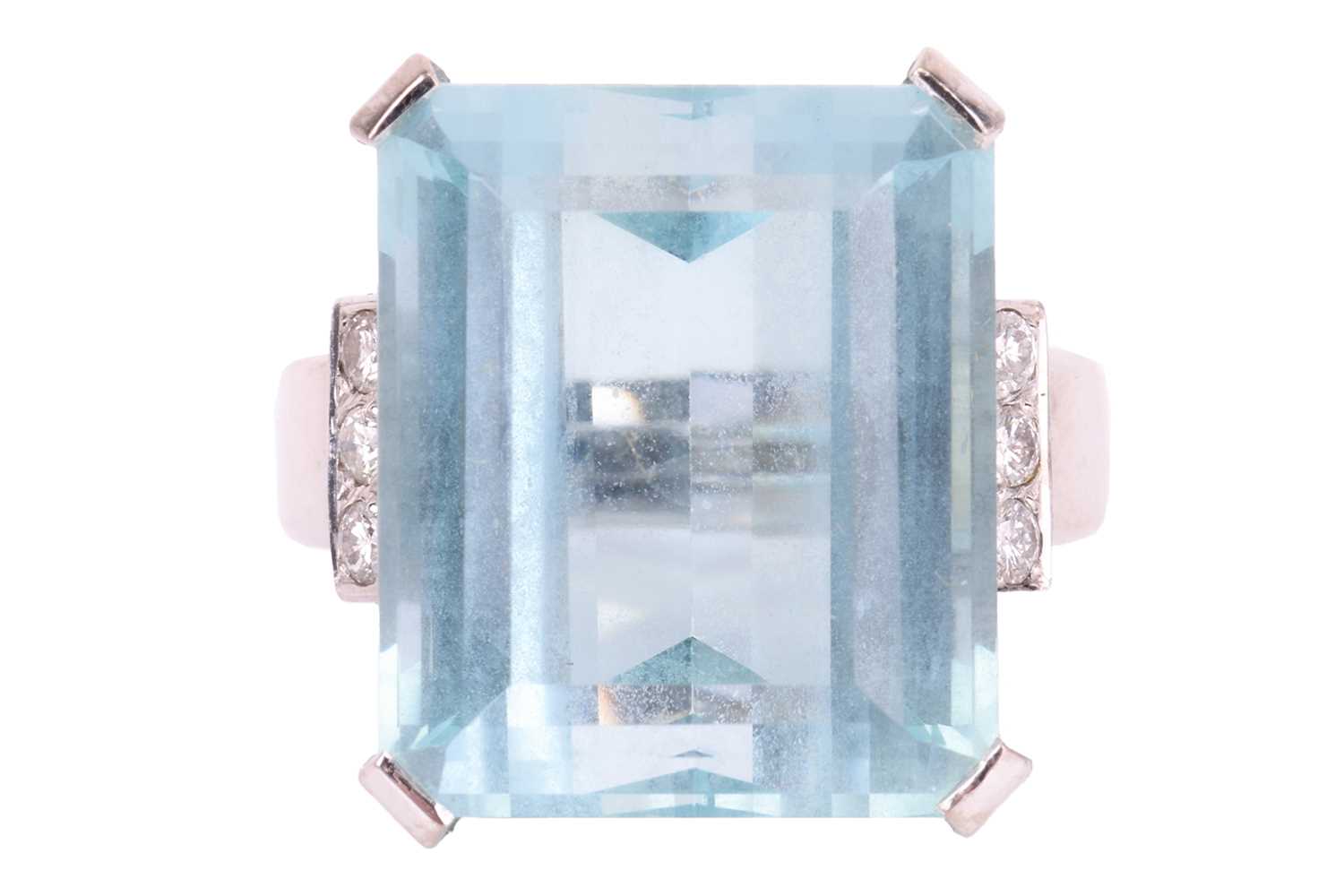 Lot 23 - A large aquamarine cocktail ring in 18ct white...