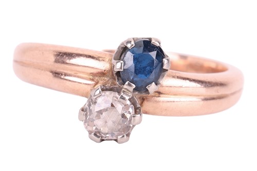 Lot A diamond and sapphire toi et moi ring in 9ct...