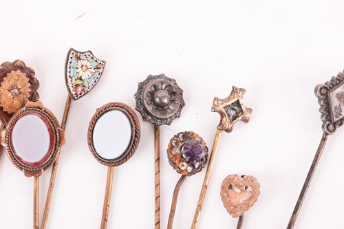 Lot 37 - A collection of stick pins; to include...