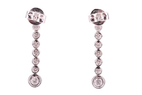 Lot 34 - A pair of diamond drop earrings, each...