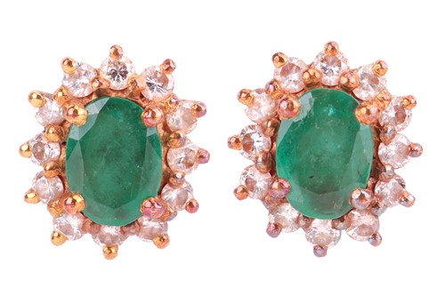 Lot 46 - A pair of emerald and diamond cluster stud...