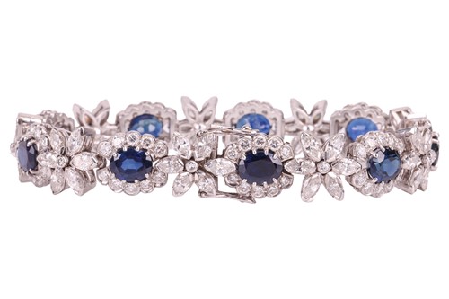 Lot 40 - A sapphire and diamond cluster line bracelet,...