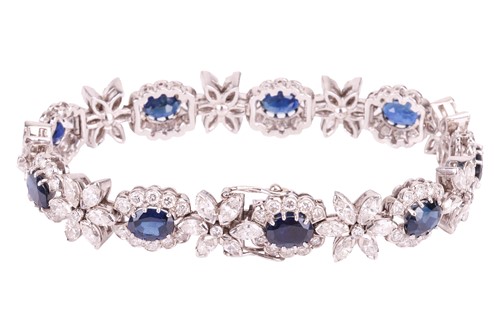 Lot 40 - A sapphire and diamond cluster line bracelet,...