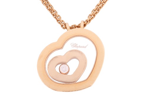 Lot 31 - Chopard - a 'Happy Spirit' heart pendant on...