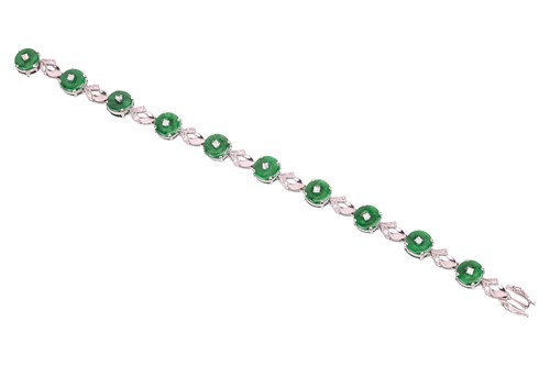 Lot 36 - A jade link bracelet, comprising claw-set...