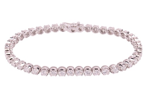 Lot 48 - A diamond-set line bracelet, set with...