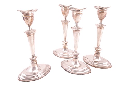 Lot 251 - A set of four silver Neo-classical style...