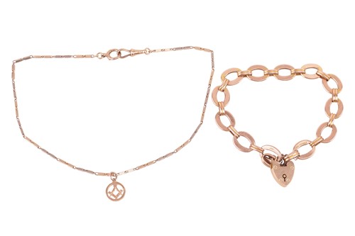 Lot 69 - A 9ct gold bracelet and watch chain; the 9ct...