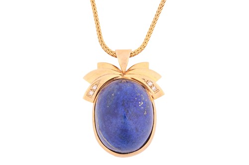 Lot 106 - A large lapis lazuli pendant on chain,...