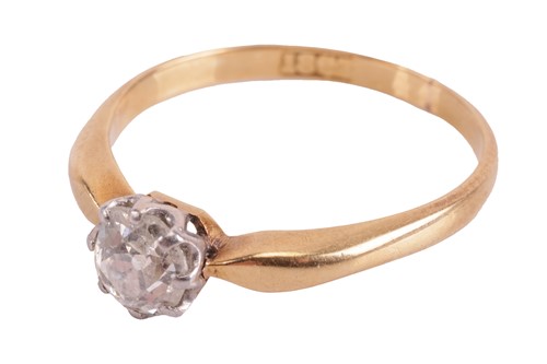Lot 107 - A diamond solitaire ring, claw-set with an old-...