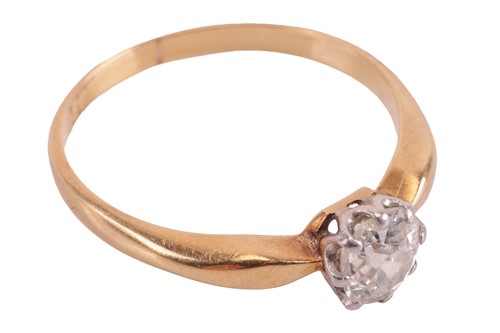 Lot 107 - A diamond solitaire ring, claw-set with an old-...