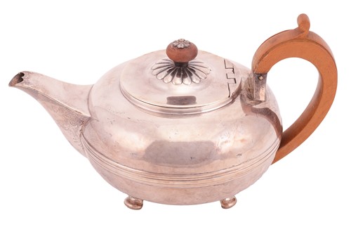 Lot 272 - A George III bachelor teapot, squat circular...