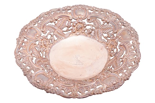 Lot 291 - A George IV silver pierced centre dish, with...