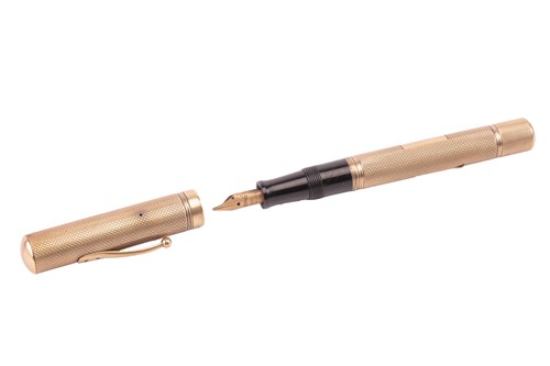 Lot 202 - A 9ct gold fountain pen by Watermans, of...