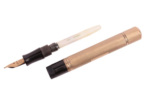 Lot 202 - A 9ct gold fountain pen by Watermans, of...