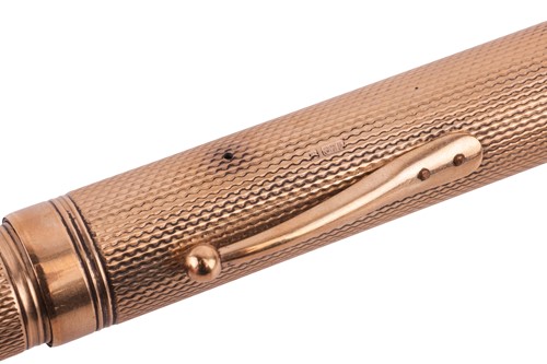 Lot 202 - A 9ct gold fountain pen by Watermans, of...