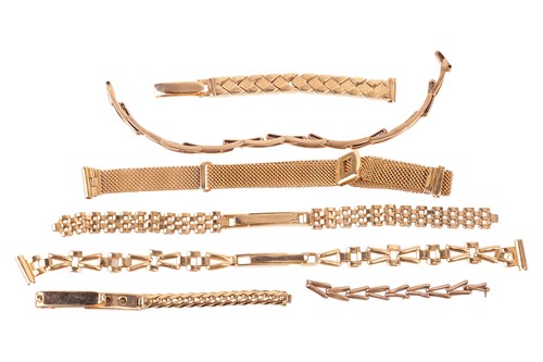Lot 67 - A collection of seven broken yellow metal...