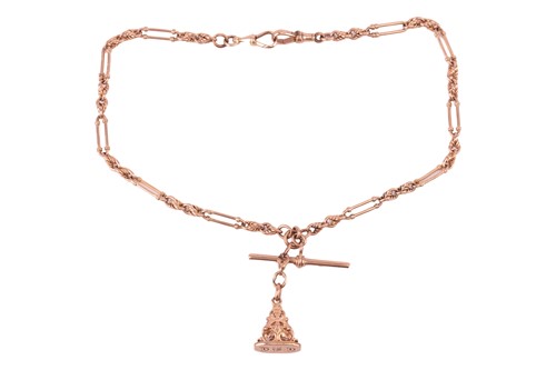 Lot 114 - An Albert chain in 9ct rose gold, the fancy...