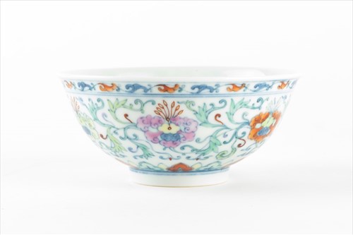 Lot 155 - A Chinese Doucai bowl decorated with flowers...