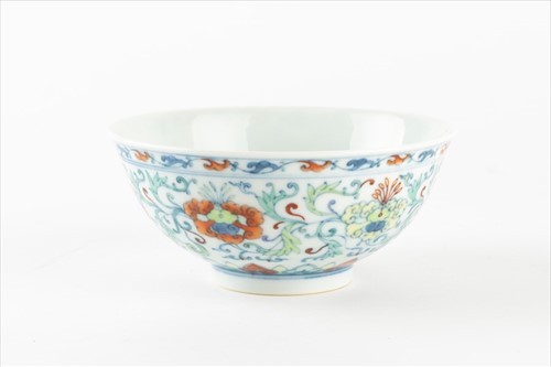 Lot 155 - A Chinese Doucai bowl decorated with flowers...