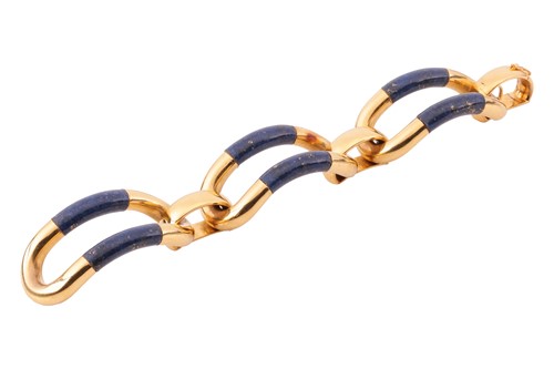 Lot 34 - A lapis lazuli bracelet, composed of three...