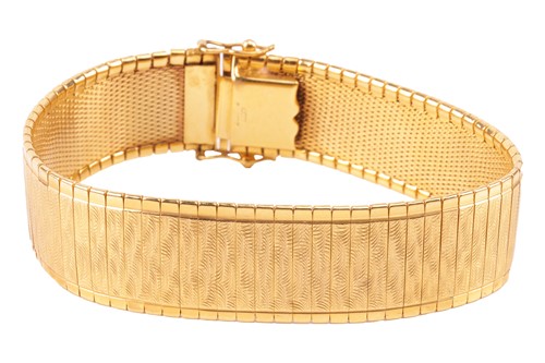 Lot 46 - A 9ct gold bracelet, highly articulated,...