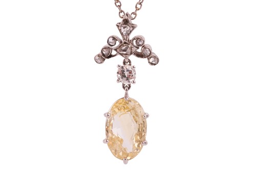 Lot 111 - A yellow sapphire and diamond-set pendant...