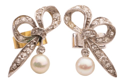 Lot 11 - A pair of pearl and diamond earrings, each...