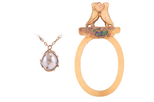 Lot 143 - An opal locket frame and a pearl pendant on...