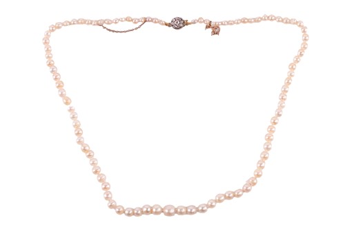 Lot 131 - A single-strand natural pearl necklace with a...