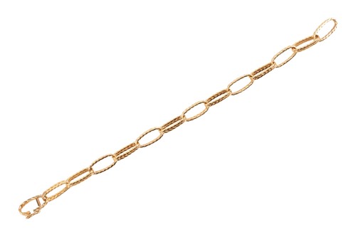 Lot 157 - An oval fancy link bracelet composed of reeded...