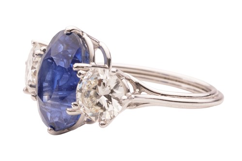 Lot 77 - An unheated Ceylon sapphire and diamond...