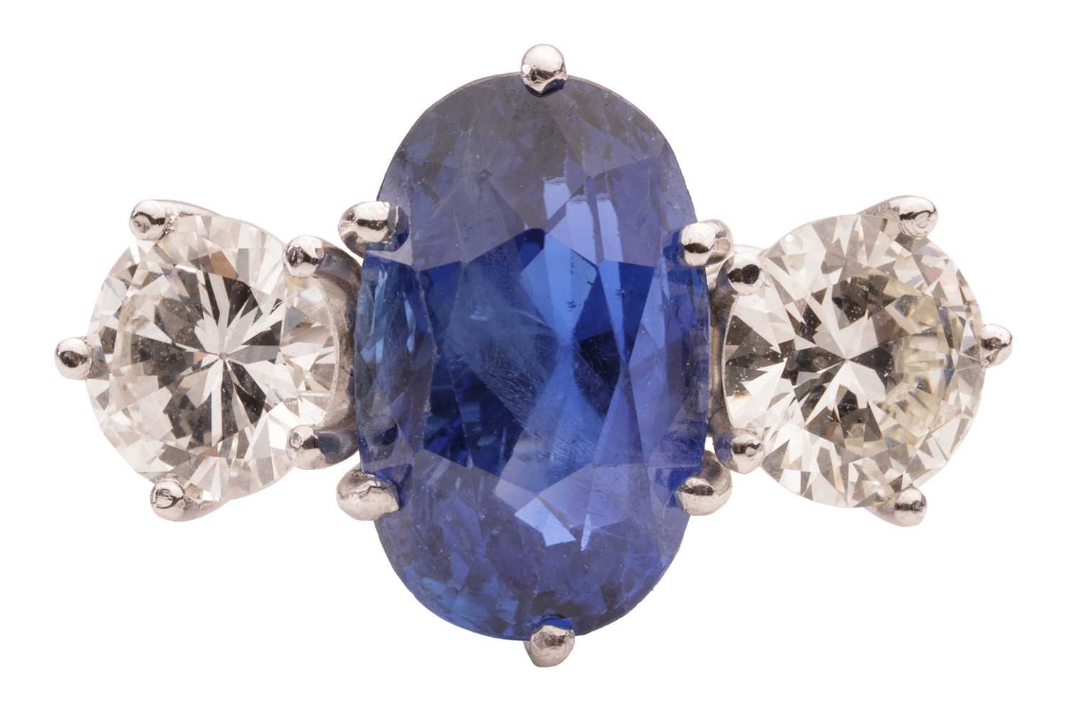 Lot 77 - An unheated Ceylon sapphire and diamond...