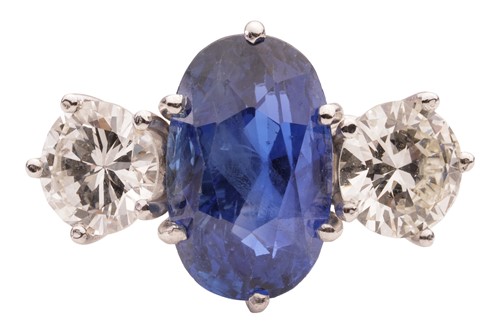 Lot 77 - An unheated Ceylon sapphire and diamond...