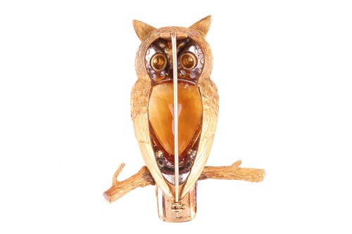 Lot 55 - A large gem-set owl brooch by E. Wolfe & Co.,...