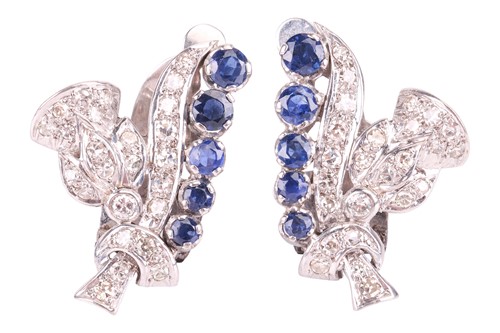 Lot 15 - A pair of floral clip-on earrings set with...