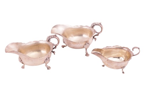 Lot 217 - A pair of Victorian silver sauceboats and...