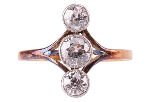 Lot 73 - A diamond trilogy ring, vertically set with...