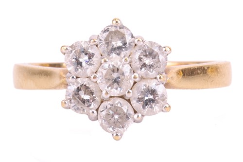 Lot 111 - A diamond-set floral cluster ring, claw-set...