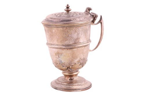 Lot 267 - An Arts and Crafts style silver jug with...