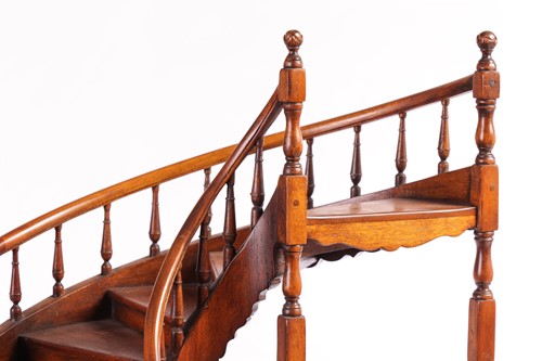 Lot 136 - Theodore Alexander: a mahogany architectural...