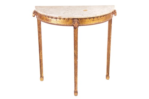 Lot 129 - An Italian marble-topped carved and gilt wood...