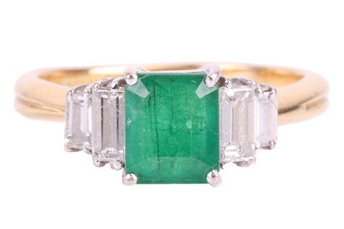 Lot 123 - An emerald and diamond dress ring in 18ct gold,...