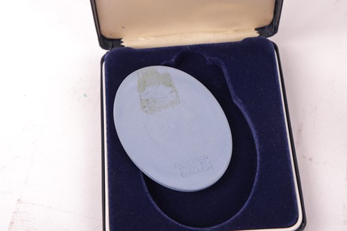 Lot 250 - A Wedgwood Portland Vase, 20th century, in...