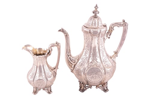 Lot 243 - A Victorian silver coffee pot and milk jug by...